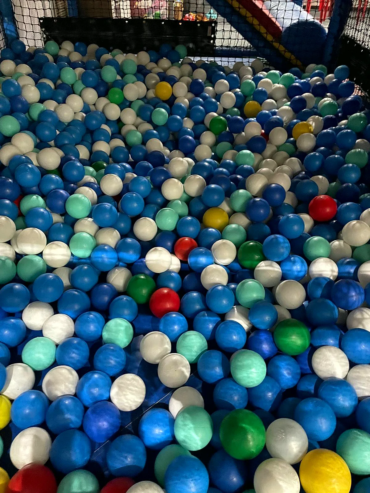 The ball pool in Captain Ted's Adventure Cove — thousands of blue, white and green balls