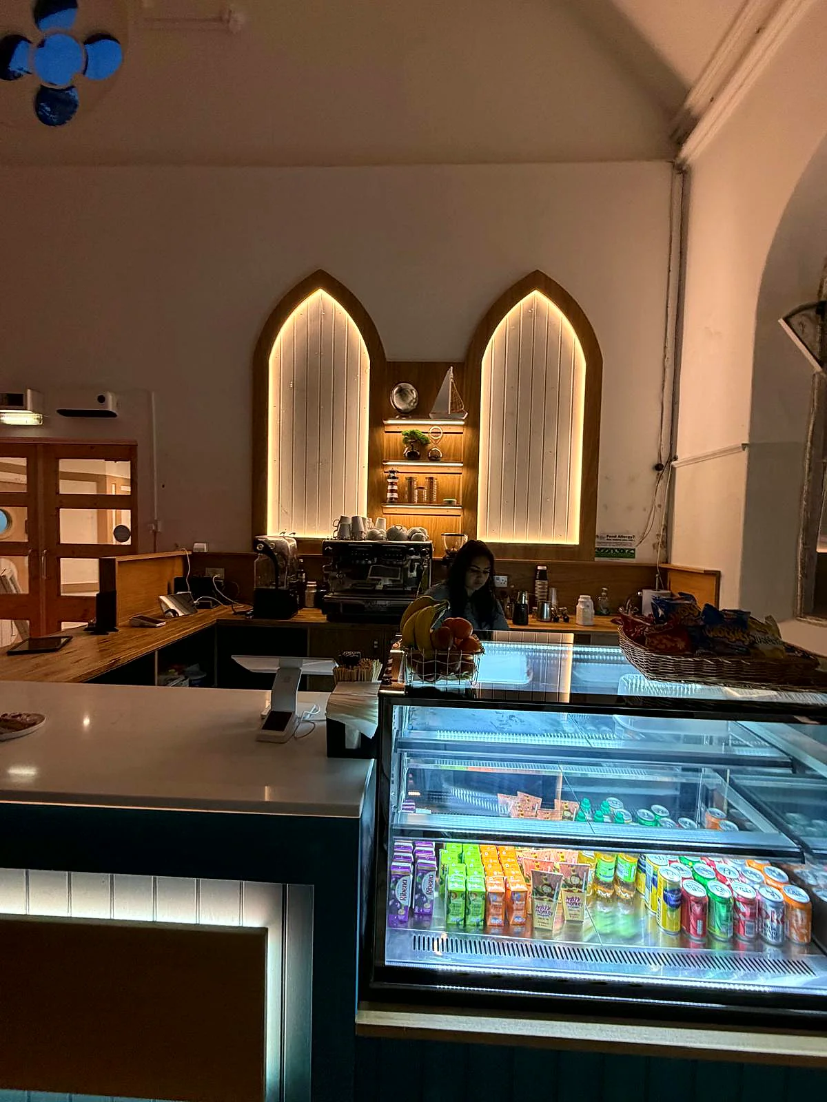 The caf&eacute; counter and drinks fridge at Captain Ted's