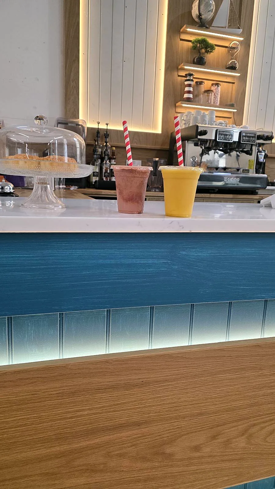 The caf&eacute; counter's blue panelling and woodwork